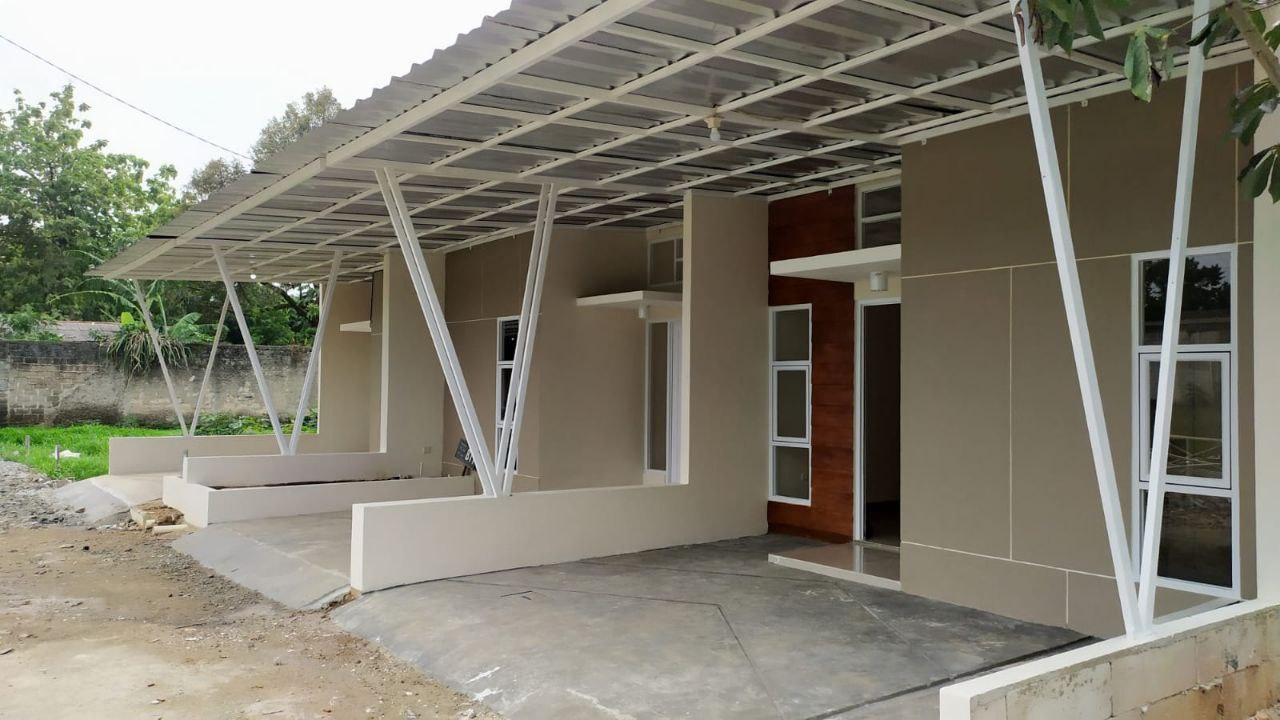 Rumah Cluster dilewati angkot pinggir jalan Citayam dekat Depok