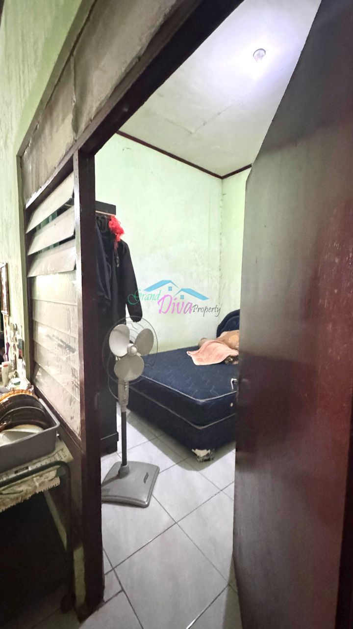 RUMAH DIJUAL DI JL. KAMBOJA PERUMNAS 1 KRANJI BEKASI