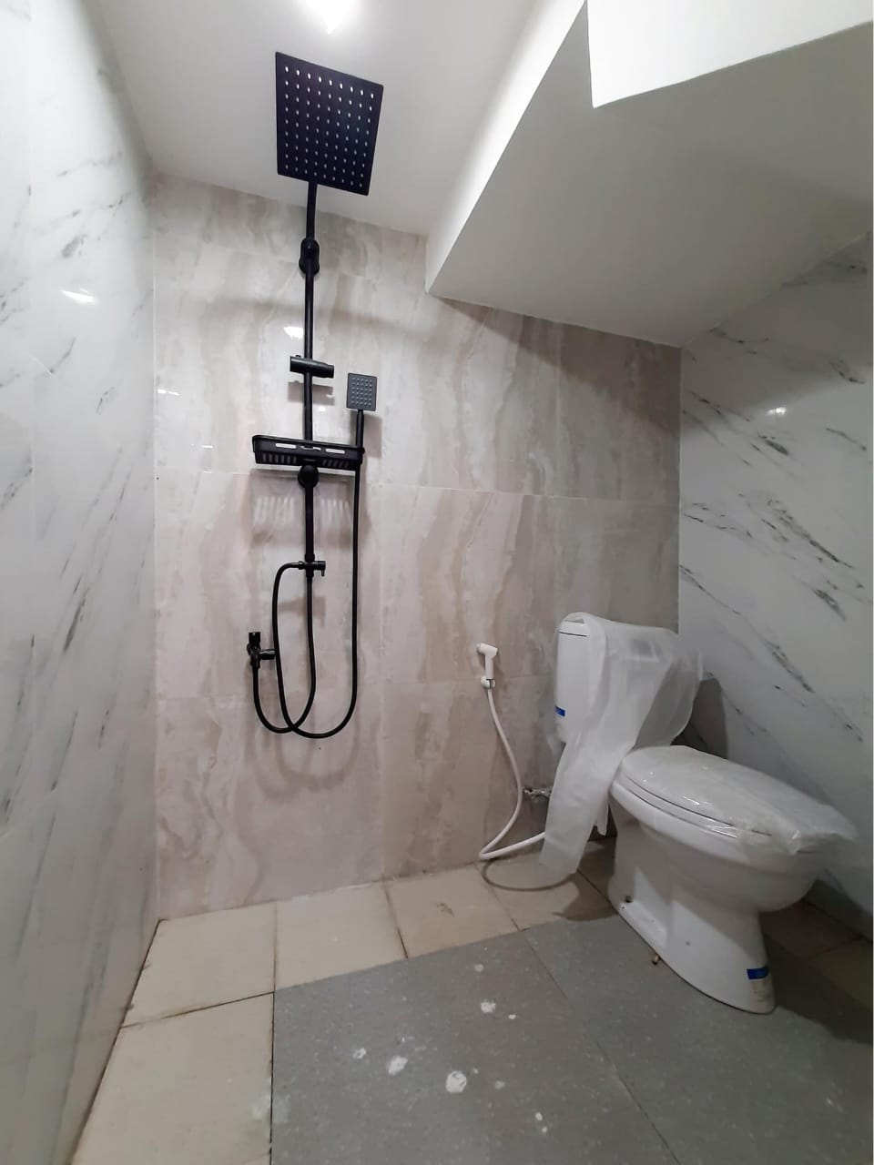 Jual rugi rumah cluster mewah di tanah Baru, Beji, Depok