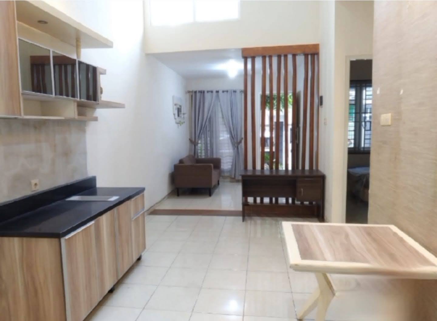 RUMAH SIAP HUNI HABIS RENOV DEKAT RAYA MERR DI PURIMAS LEGIAN