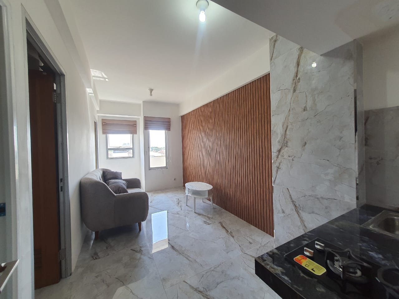 Sewa 2 Unit Apartemen 2BR Di Puncak Permai Tower A - Surabaya
